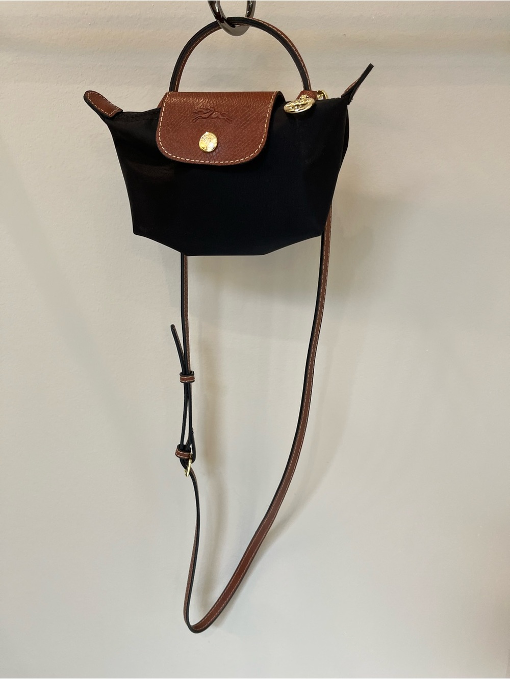 Longchamp Black Crossbody Bag with Brown Trim and Gold Hardware